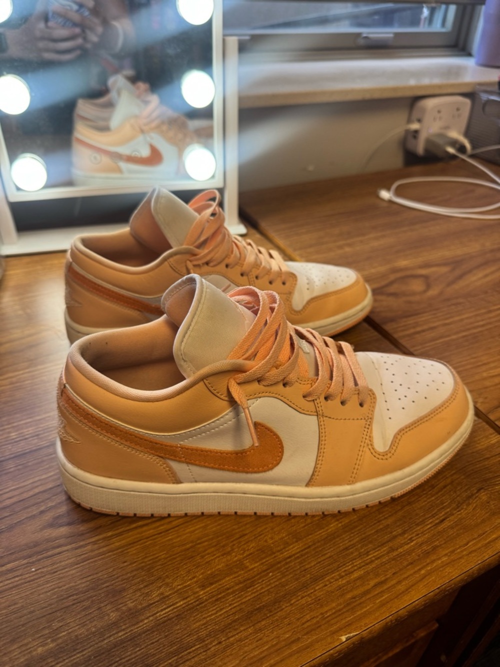 Air Jordan 1 Peach and White Low-Top Sneakers (women’s 10.5 men’s 9)